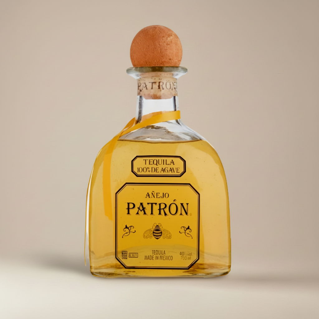 Patrón Añejo bottle in a clean premium studio setting